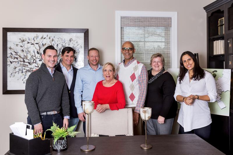 Celebrating 2017 business successes are (l-r) Jeff Hecker, Dustin Oldfather, Adam Linder, Celia Benjamin, Bob Burton, Sue Huntington and Mariya Oldfather. SUBMITTED PHOTO
